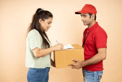 indian-woman-receiving-box-courier-600nw-2248444875